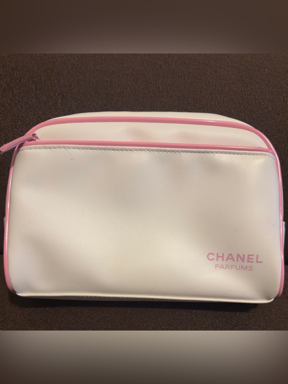 CHANEL White Cosmetic Pouch with Pink Trim. 9.25”W x 7”H.